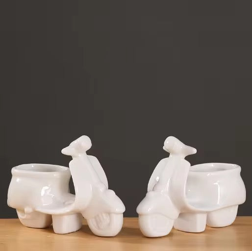 White scooter ceramic planter