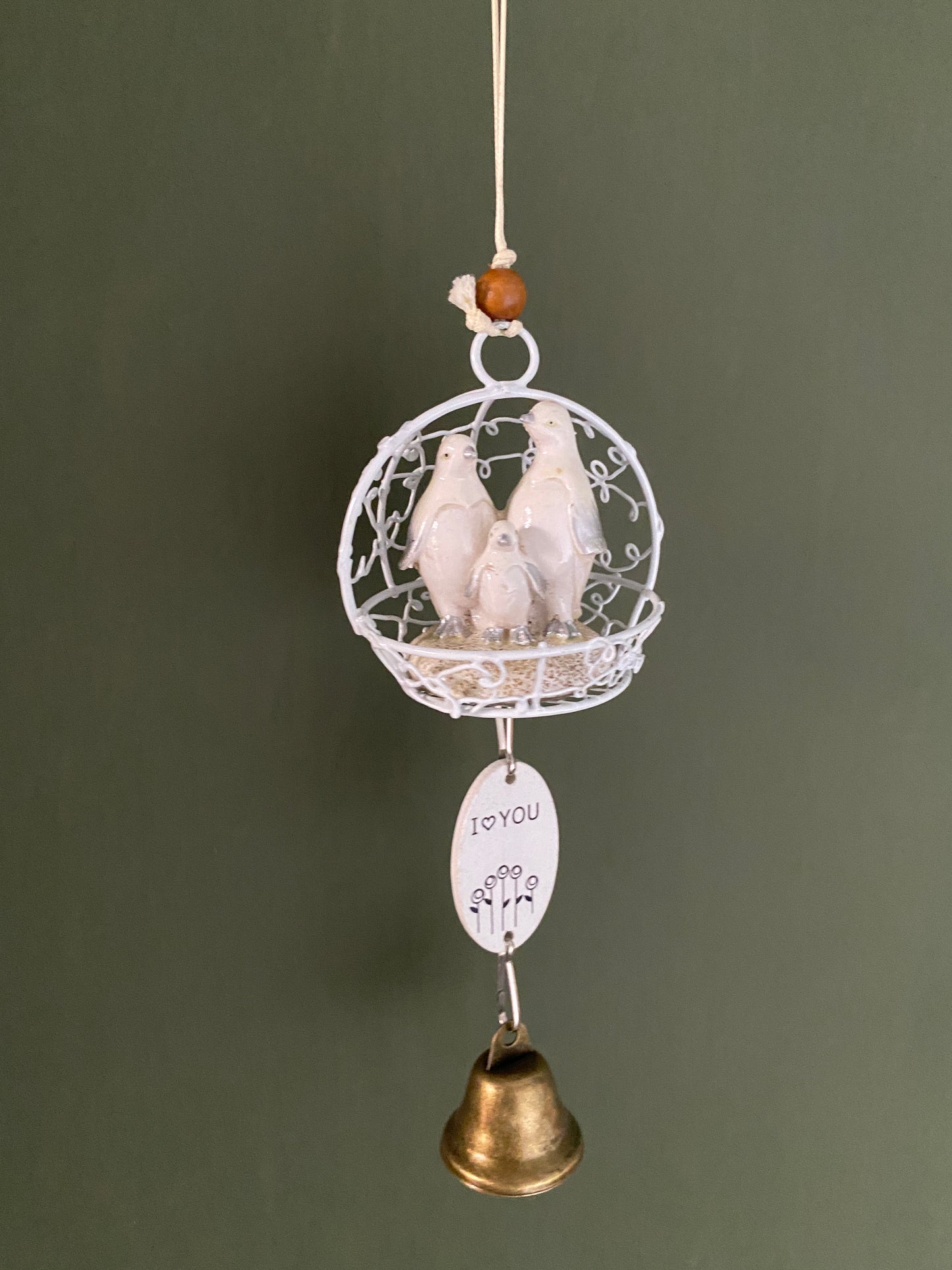 Ceramic penguin figurine in cage themed windchime