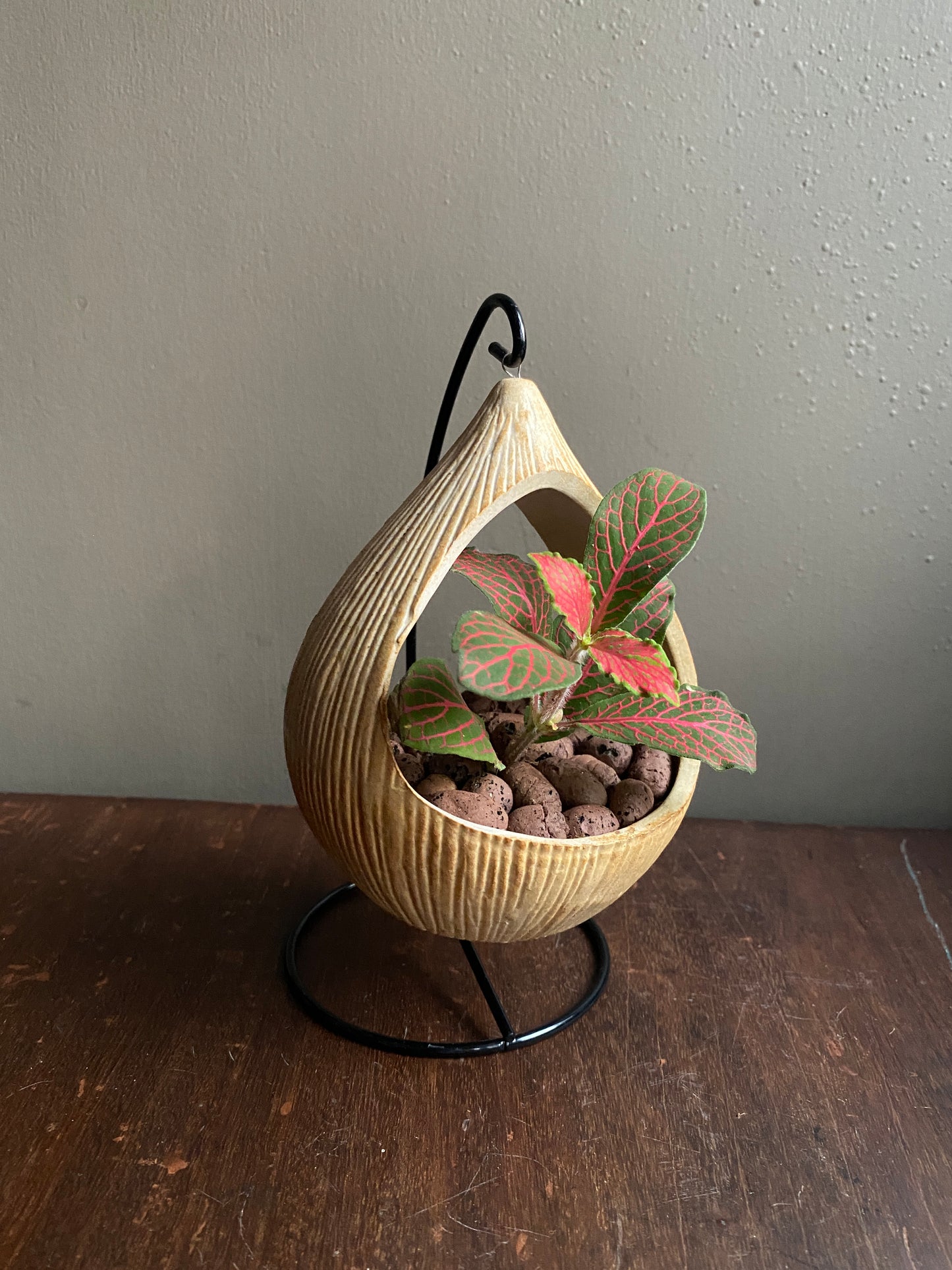 Yellow ceramic planter with metallic stand