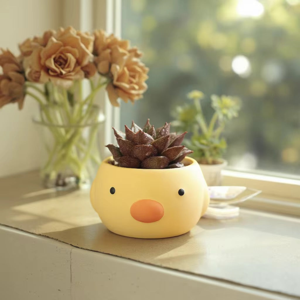 Yellow duck ceramic planter