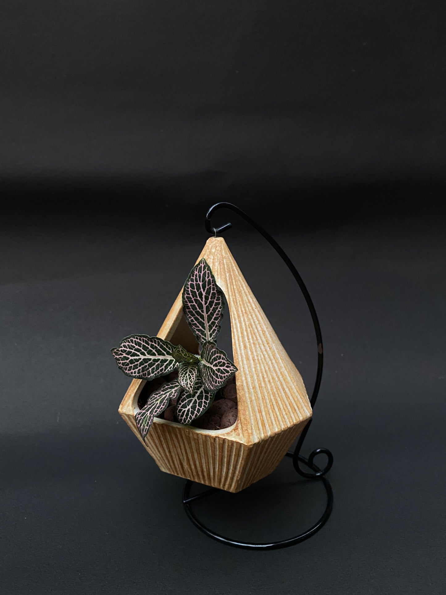 Yellow ceramic planter with metallic stand