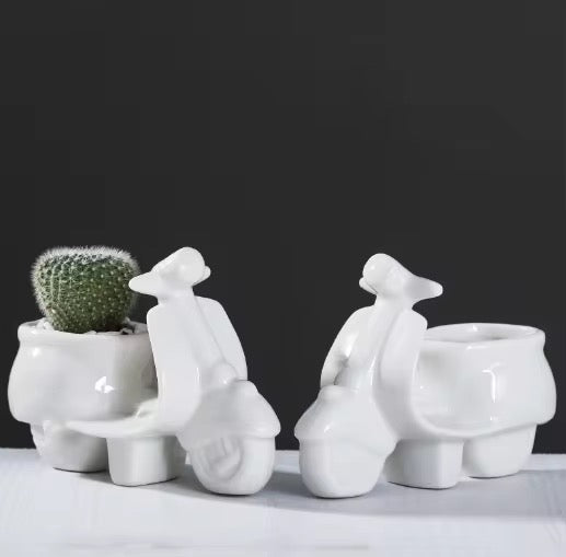 White scooter ceramic planter