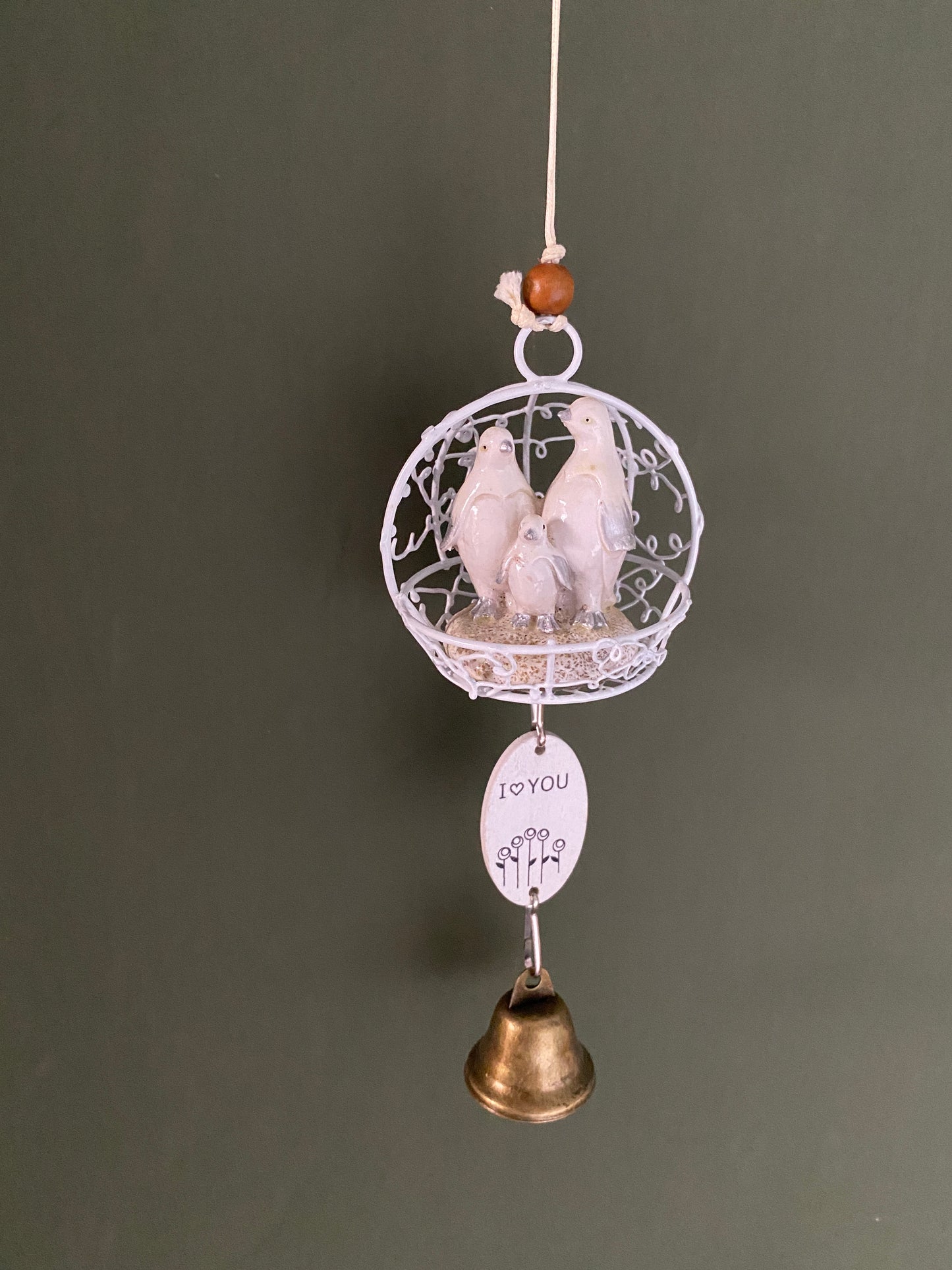 Ceramic penguin figurine in cage themed windchime