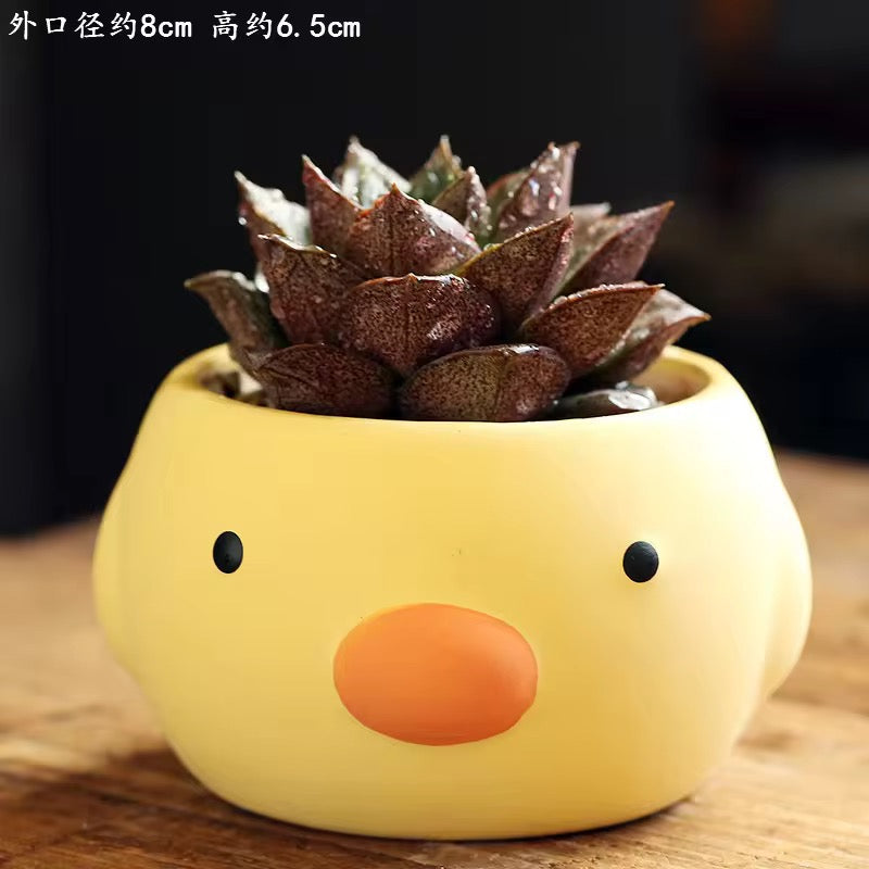Yellow duck ceramic planter