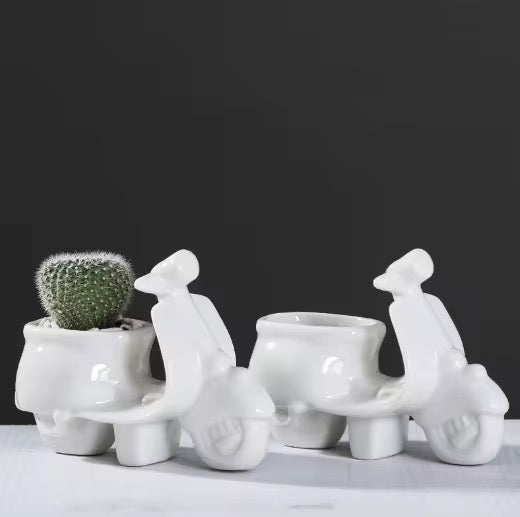 White scooter ceramic planter