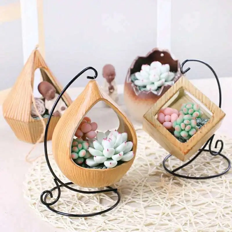 Yellow ceramic planter with metallic stand