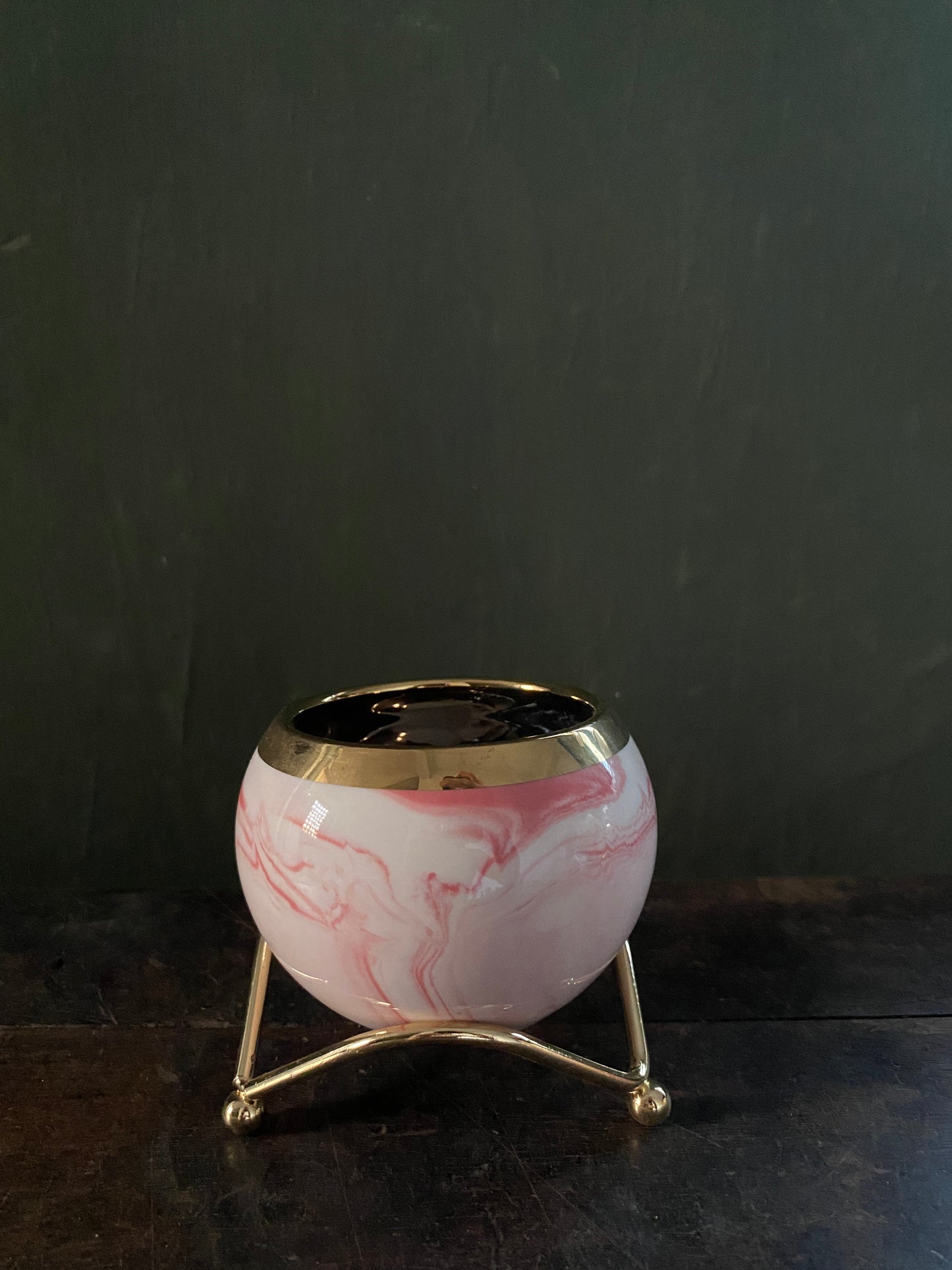 White pink marble designed planter with golden stand