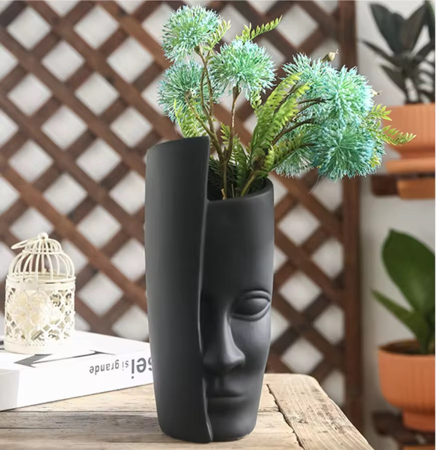 Black ceramic face pot