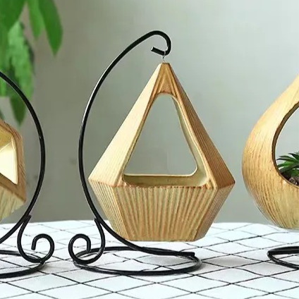 Yellow ceramic planter with metallic stand