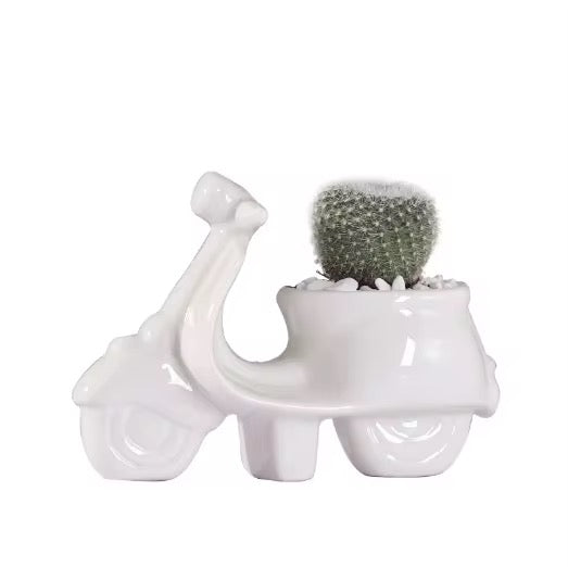 White scooter ceramic planter