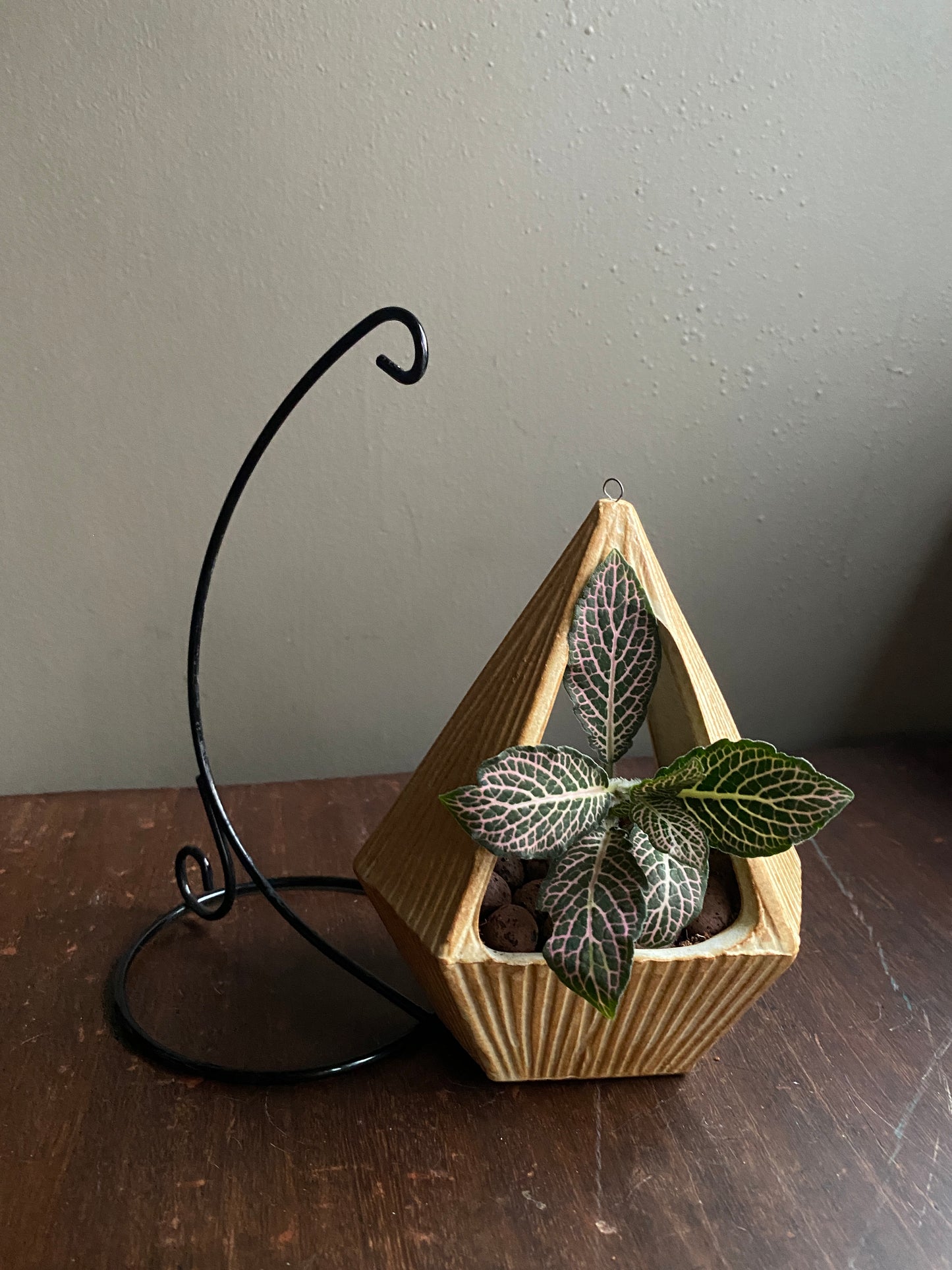 Yellow ceramic planter with metallic stand