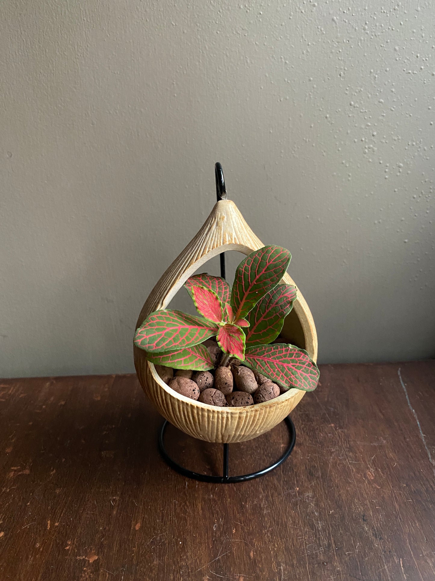 Yellow ceramic planter with metallic stand