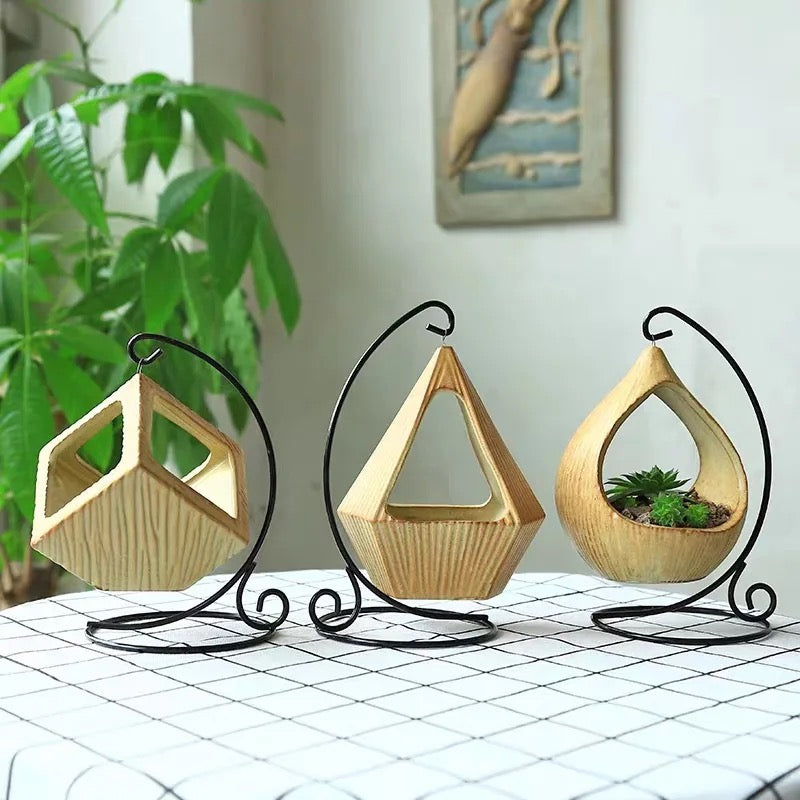 Yellow ceramic planter with metallic stand