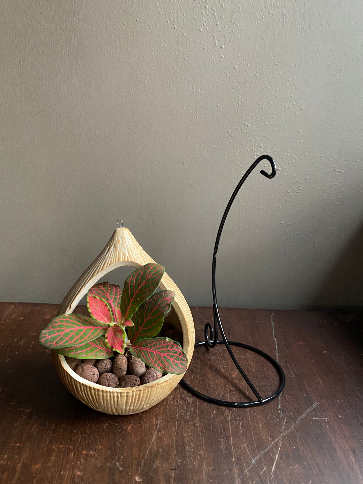 Yellow ceramic planter with metallic stand