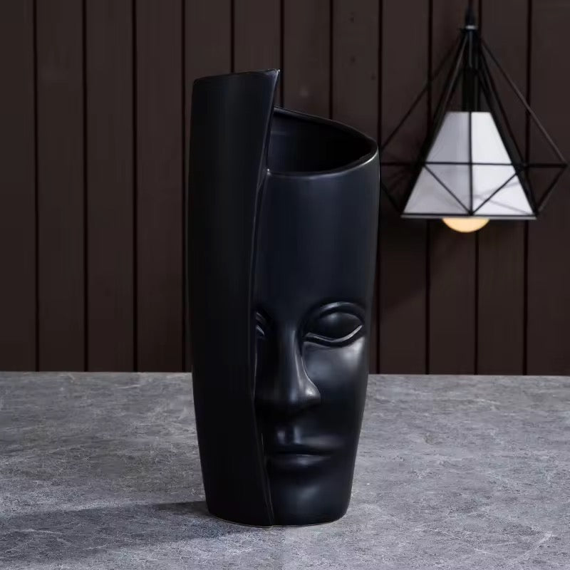 Black ceramic face pot