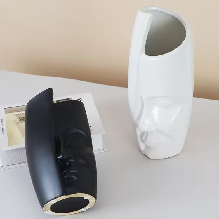 Black ceramic face pot