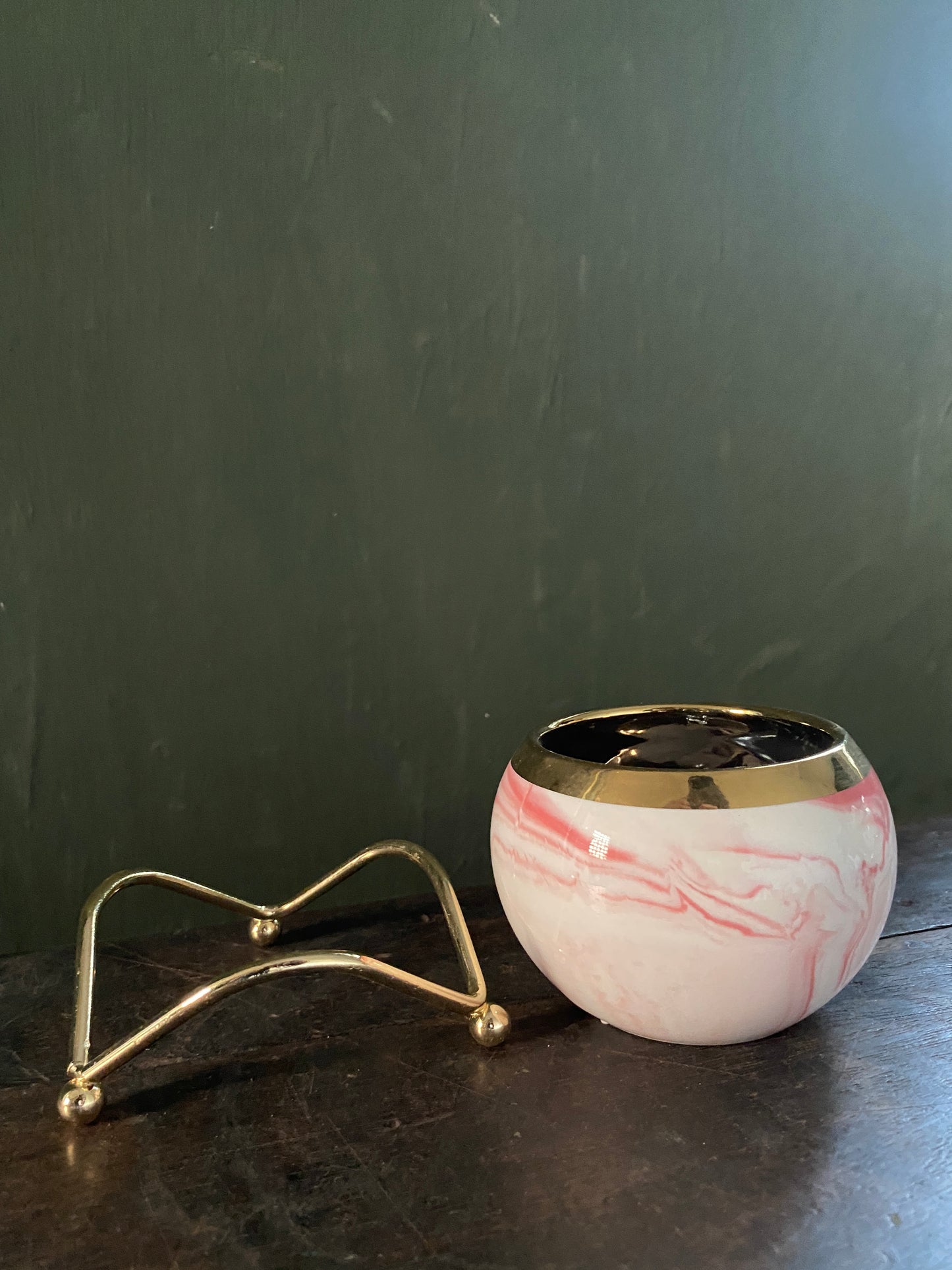 White pink marble designed planter with golden stand