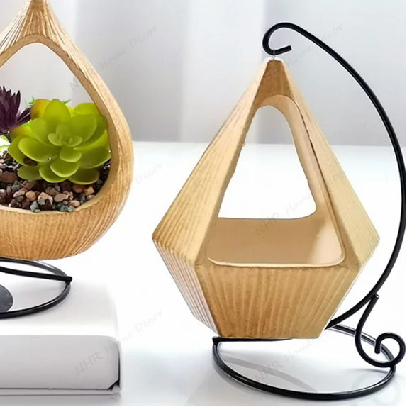 Yellow ceramic planter with metallic stand