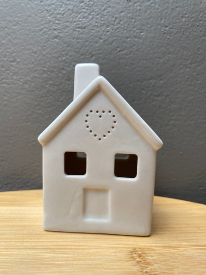 White ceramic small home themed candle holder