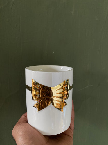 White golden ribbon designed ceramic planter