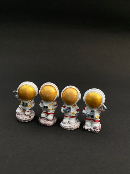 Set of 4 astronaut polystone miniatures