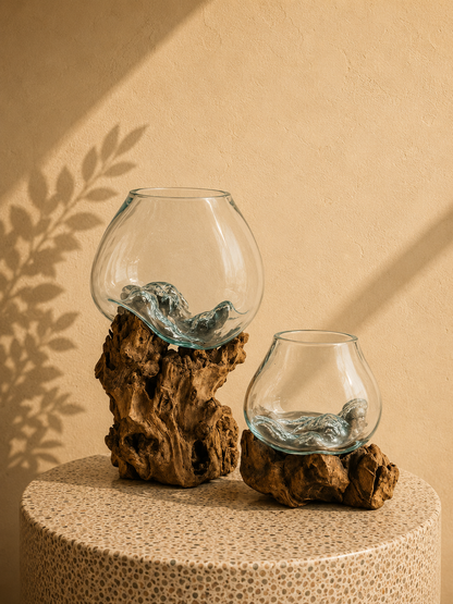 Handcrafted molten glass bowl on natural teak driftwood from Bali