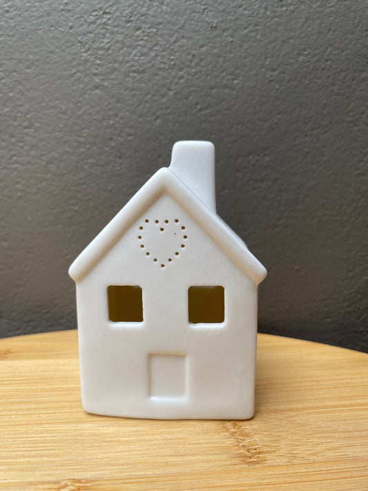 White ceramic small home themed candle holder