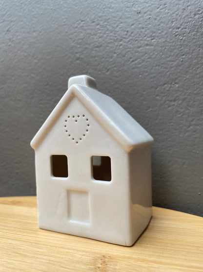 White ceramic small home themed candle holder